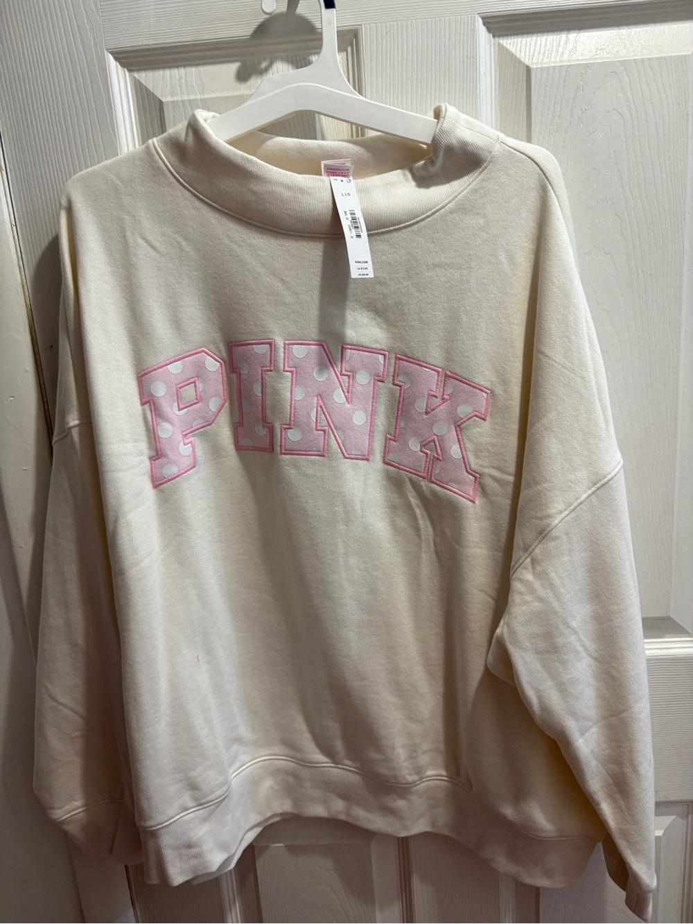 PINK polka dot crewneck